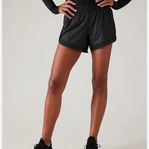 Athleta Women's mesh racer run 4” Athletic Shorts size small